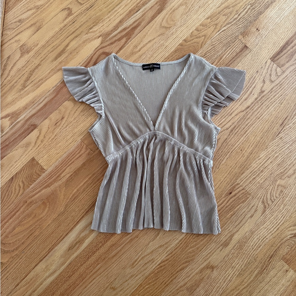 Gold fairy top ribbed with flutter sleeves
Baby doll top